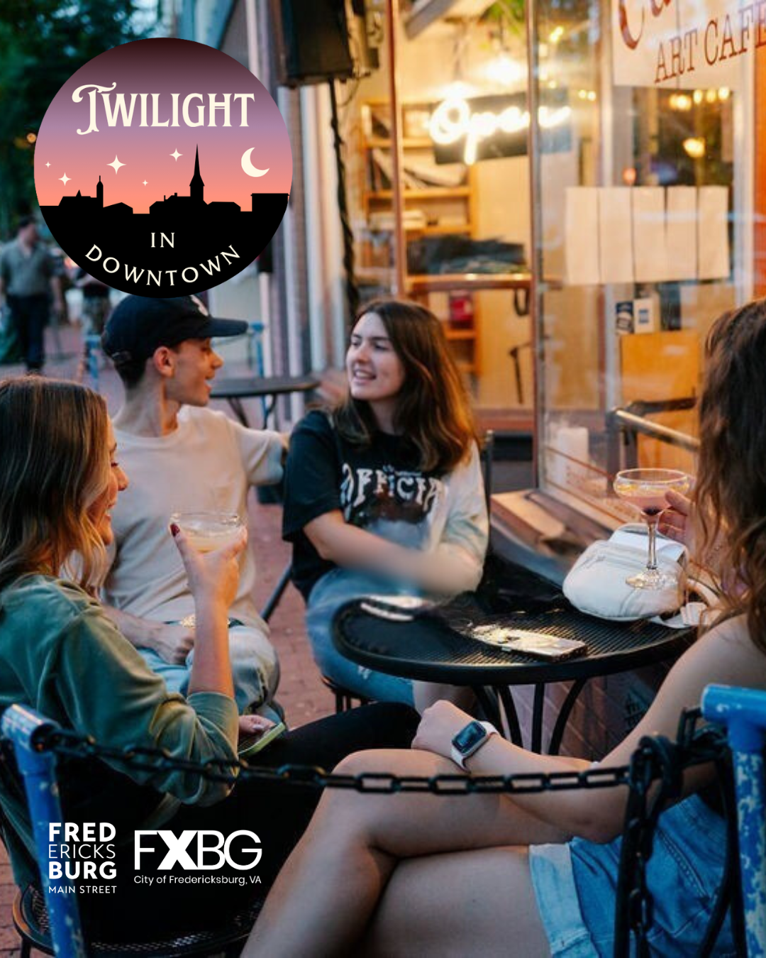 Image of friends sitting at a table outside of a coffee shop. 