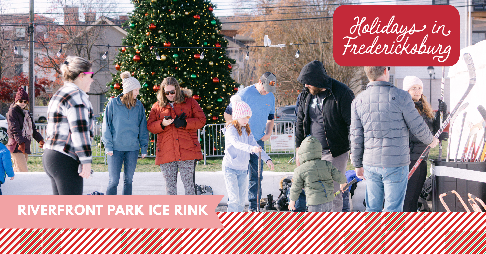 Photo of a group ice skating in front of the Downtown Christmas Tree. 
